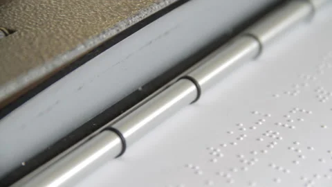 Closeup shot braille typewriter machine working Stock Footage 139099304