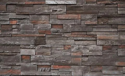 Closeup shot of a brick wall in a random pattern Stock Photos