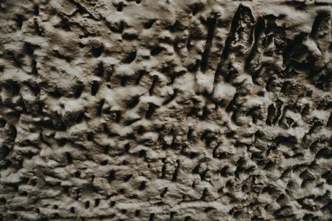Closeup shot of bumpy rough stone texture Stock Photos