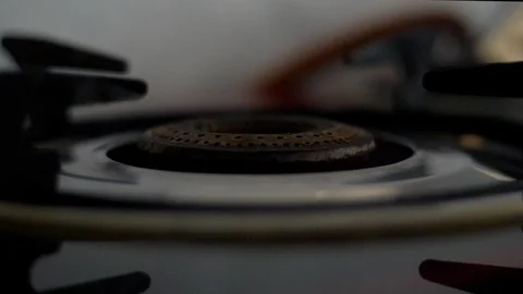 Closeup shot of burning blue flames of a gas stove Stock Footage 115031533