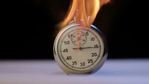 A closeup shot of a burning stopwatch 库存影片 221235691
