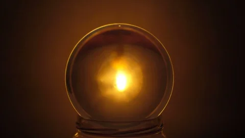 Closeup shot of a candle inside a crystal ball Stock Footage 96029549