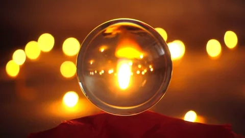 Closeup shot of a candle inside a crystal ball Stock Footage 97375138