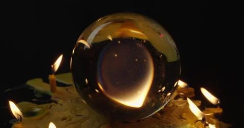 Closeup shot of a candle inside a crystal ball Stock Footage 168717007