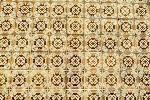 Closeup shot of a ceramic wall with patterns in Lisbon, Portugal Illustrazione stock