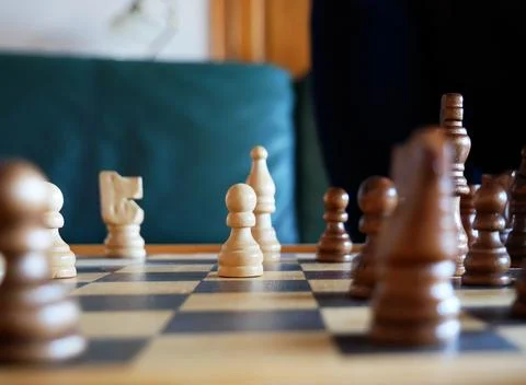 Closeup shot of a chessboard with the focus on a white's pawn Stock Photos