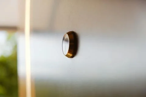 Closeup shot of a clock on the wall with blurred background 写真素材