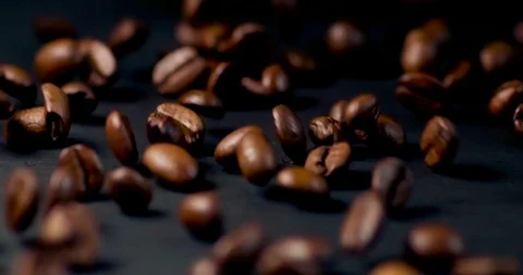 Closeup Shot of Coffee Beans Falling in Slow Motion Stock Footage 105879097