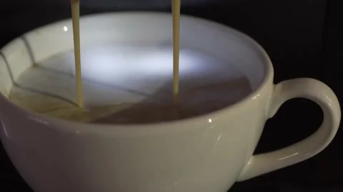 Closeup shot of coffee machine makes espresso in a white cup Stock-Footage 137603138