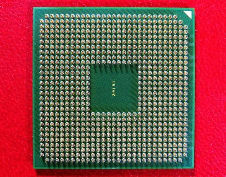 A closeup shot of Computer CPU (central processor unit) chip isolated on a re Stock Photos
