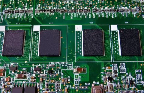 Closeup shot of computer memory chip with four processors 스톡 사진