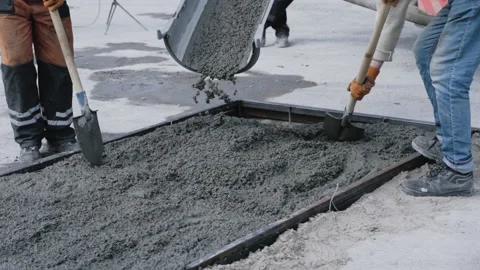 Closeup shot of concrete casting on reinforcing metal bars of a slab on the Stock Footage 152059281