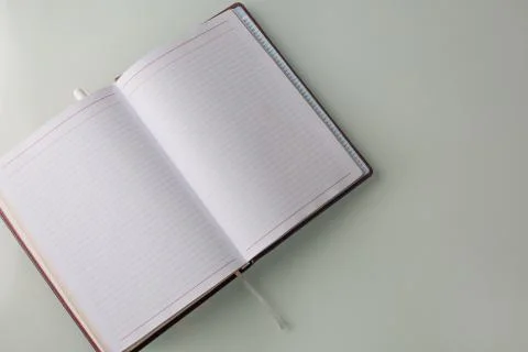 Closeup shot of a diary on a grey table Stock Photos