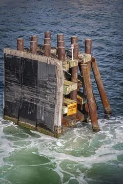 Closeup shot of a dock piling off the coast of cape cod at a ferry terminal in t Stock Photos