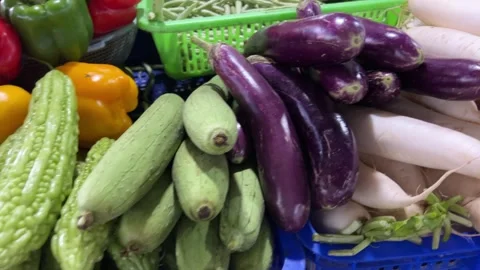 A closeup shot with downward tilting view of various raw vegetables like Video stock 307671785