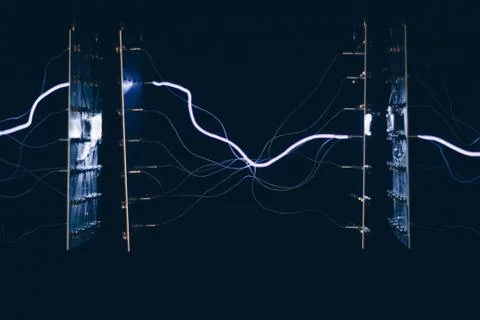 A closeup shot of electrical chipsets transmitting energy through each other  Stock Photos