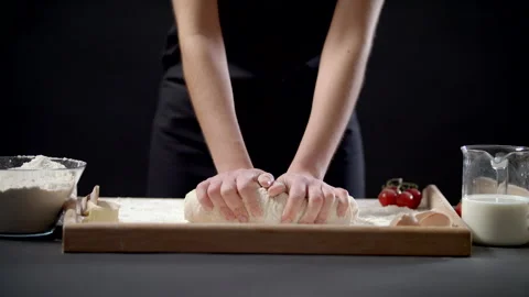 Closeup Shot Of Female Hands Of Baker Kneading Dough In Flour On Wooden Board Stock Footage 170239933