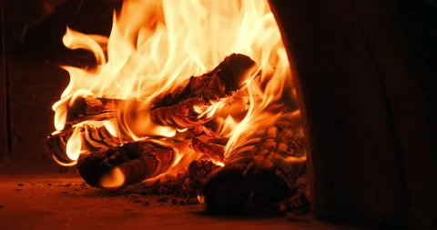 Closeup shot of fire wood burning in the oven. Traditional Italian pizzeria Stock Footage 247920769