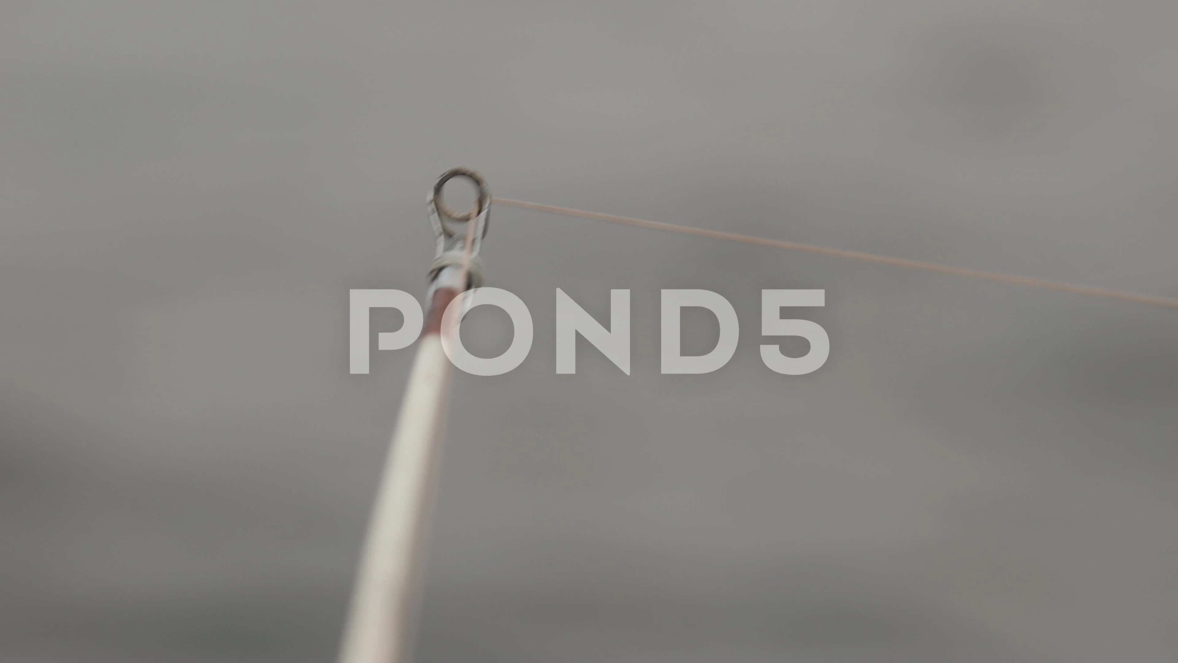 Closeup shot of a fishing pole tip with , Stock Video