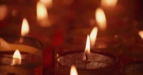 A closeup shot of flame on candle Stock Footage 90542372