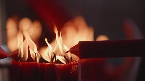 A closeup shot of flame on candle in slow motion Stock Footage 88849392