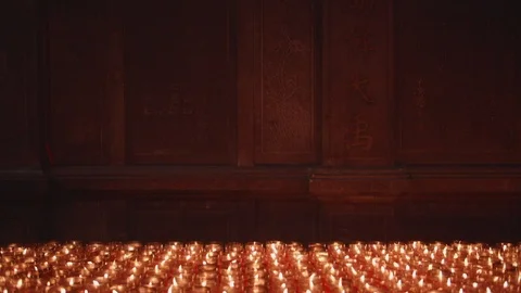 A closeup shot of flame on candle in slow motion Stock Footage 88850267
