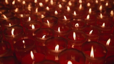A closeup shot of flame on candle in slow motion Stock Footage 88850374