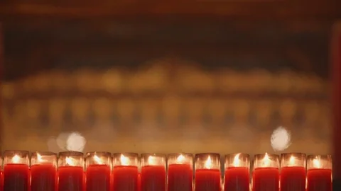 A closeup shot of flame on candle in slow motion Stock Footage 88850484