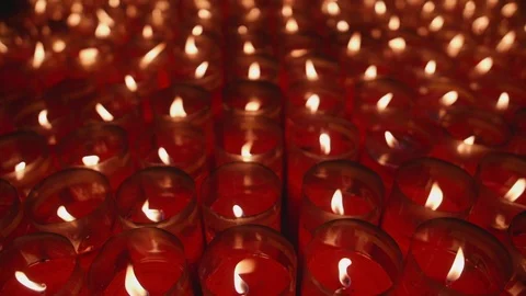 A closeup shot of flame on candle in slow motion Stock Footage 88850636