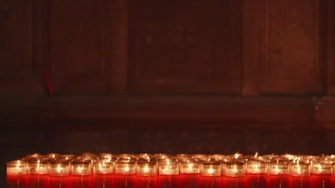 A closeup shot of flame on candle in slow motion Stock Footage 88850669