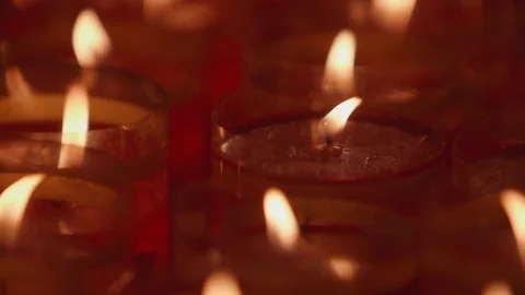 A closeup shot of flame on candle in slow motion Stock Footage 88851074
