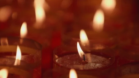 A closeup shot of flame on candle in slow motion Stock Footage 88851219