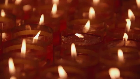 A closeup shot of flame on candle in slow motion Stock Footage 88851292
