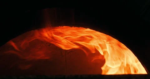 Closeup shot of flames in the oven. Slow motion burning bonfire. Burning Stock Footage 246640677