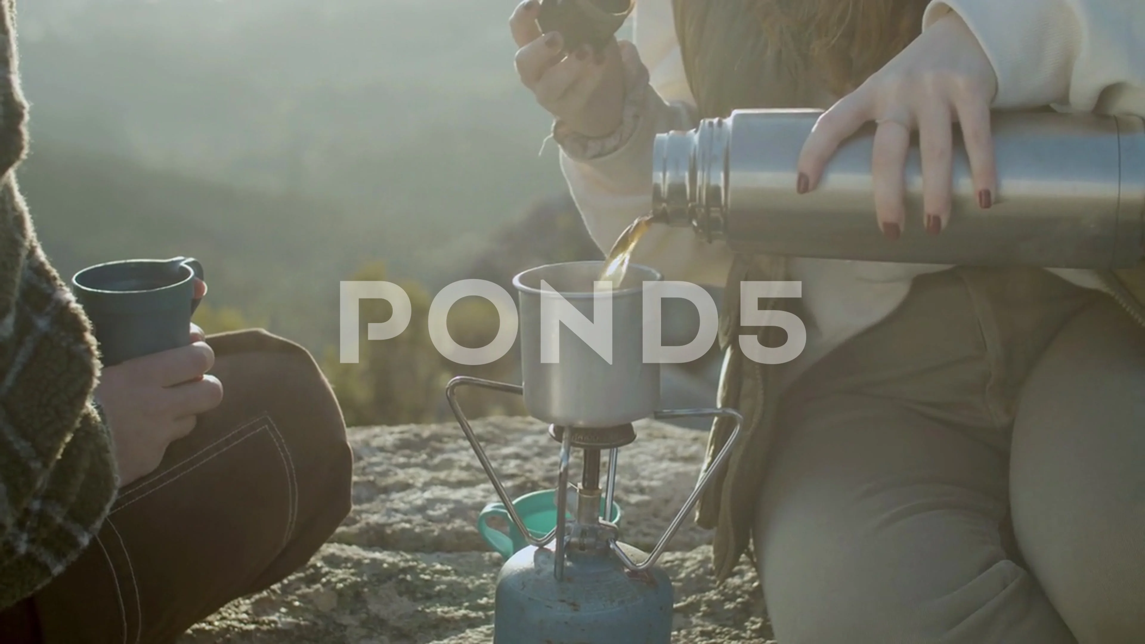 https://images.pond5.com/closeup-shot-girl-pouring-hot-footage-172522256_prevstill.jpeg