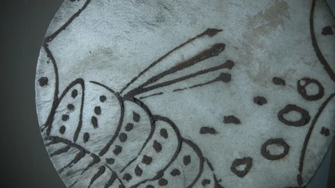 Closeup shot of the hand of a man tapping on a bongo. Stock Footage 122283515