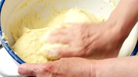 Closeup shot of hands Baker kneading dough flour on table, Close-up kitchen.. Stock Footage 272469556