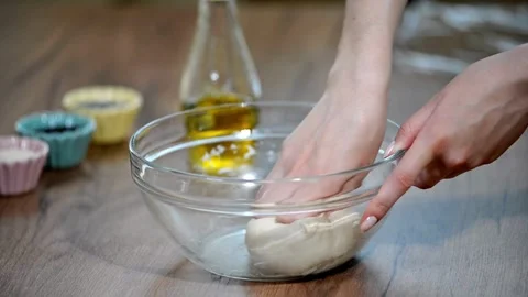 Closeup shot of hands Baker kneading dough flour on table, Close-up kitchen.. Stock Footage 272469599