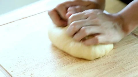 Closeup shot of hands Baker kneading dough flour on table, Close-up kitchen.. Stock Footage 272469720