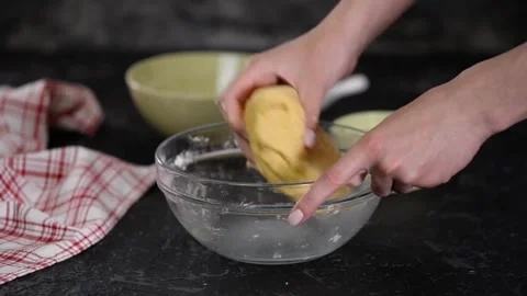 Closeup shot of hands chef bakery kneading dough applying flour on dough ma.. Stock Footage 272469440