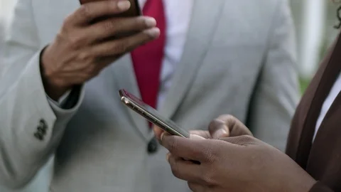 Closeup shot of hands using modern smartphones Stock Footage 114964033