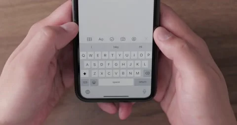 Closeup shot of hands using smartphone Stock Footage 138341112