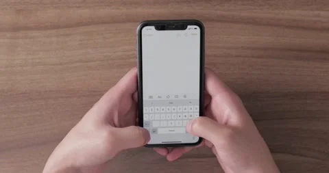 Closeup shot of hands using smartphone Stock-Footage 138341121
