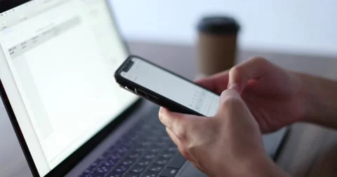 Closeup shot of hands using smartphone Stock Footage 138341291