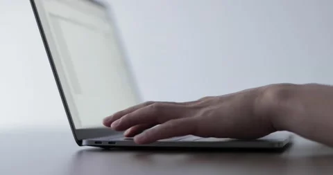 Closeup shot of hands working with laptop Stock Footage 138341304