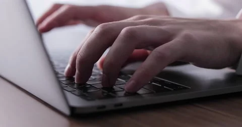 Closeup shot of hands working with laptop Stock Footage 138341338