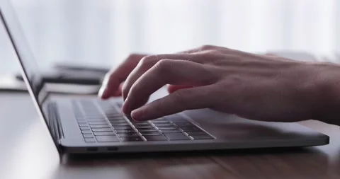 Closeup shot of hands working with laptop Stock Footage 138341358