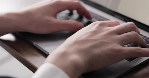 Closeup shot of hands working with laptop Stock Footage 138341398