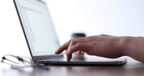 Closeup shot of hands working with laptop Stock Footage 138341571