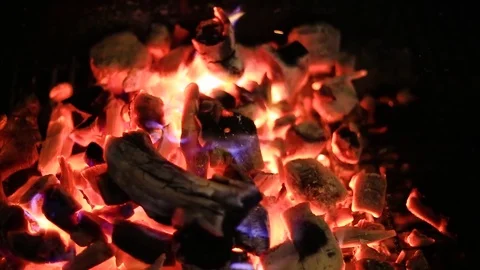 Closeup shot of a hot coal fire. Видео 81228428